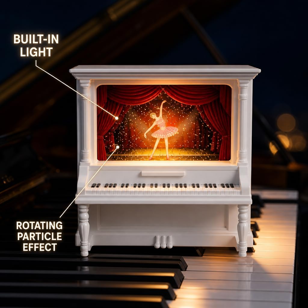 Ballerina snow globe on piano stage with LED lighting